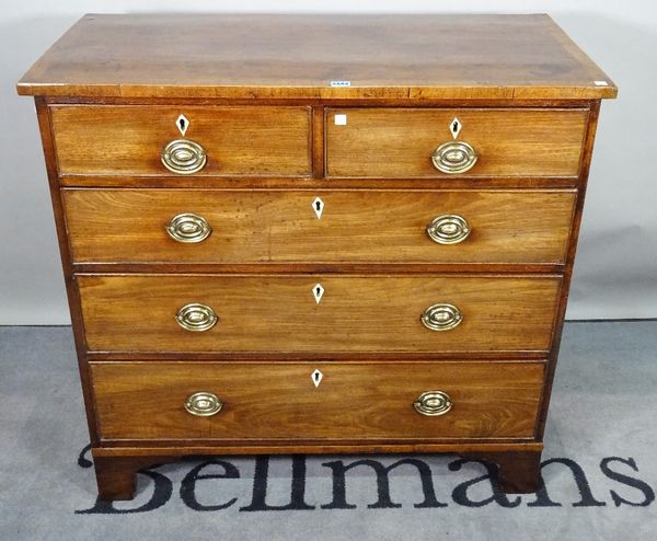 A George III mahogany chest of two short and three long graduated drawers on bracket feet, 97cm wide x 92cm high.