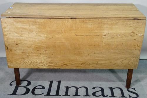 An early 19th century elm drop flap dining table, 120cm wide x 77cm high.