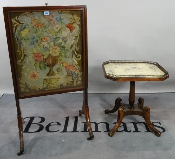 A late Victorian mahogany fire screen, on downswept supports, 56cm wide x 104cm high, and a late Victorian octagonal side table, on four downswept sup