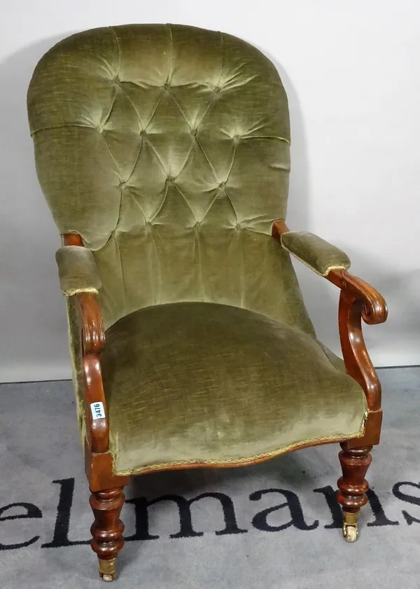 A late Victorian mahogany framed low open armchair, with green button back upholstery, 98cm high x 62cm wide.