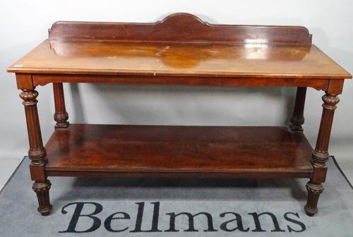 A late George III and later mahogany two tier buffet, on fluted tapering supports, 153cm wide x 93cm high.