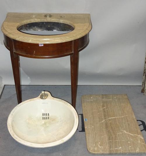 An early 20th century mahogany framed demi-lune sink with galleried marble top on tapering square supports, 75cm wide x 80cm high.