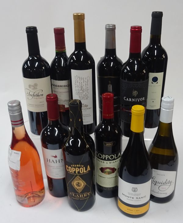 Box 142 - North American Wine  Okanagan Falls Chardonnay 2018  50th Parallel Pinot Noir Rosé 2019  Monte Xanic Syrah 2017  Woodbridge Cabernet Sauvign