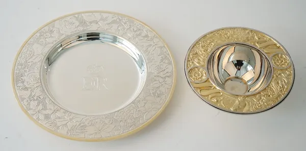 Silver, comprising; a Britannia standard circular dish, the border decorated with national floral symbols detailed to the underside Golden Jubilee H.M