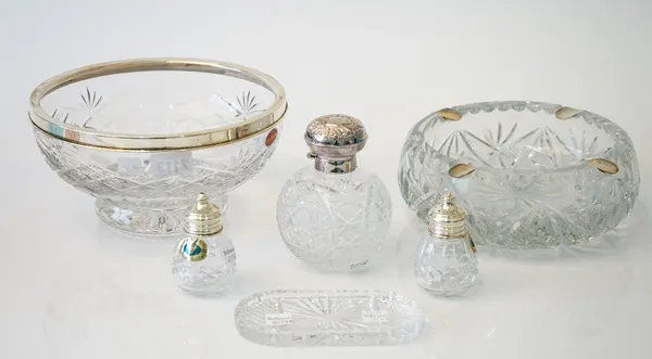 A group of silver mounted glass wares, comprising; a Royal Brierley faceted glass bowl, diameter 20.5cm, a large faceted glass ashtray, the rim mounte