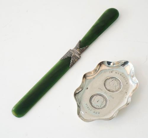 A silver shaped oval trinket dish, mounted with a Victoria old head shilling 1900 and with an Edward VII shilling 1902 and detailed 'In Memoriam Jan.