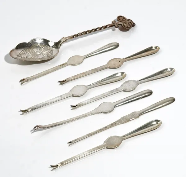 Silver, comprising; four lobster picks Sheffield 1919, one lobster pick Sheffield 1918, a Danish lobster pick import mark London 1922, combined weight