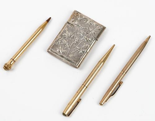 A Chinese rectangular visiting card case, decorated to one side with dragons and to the other side with bamboo (hinge broken), 7.5cm x 5.2cm and three