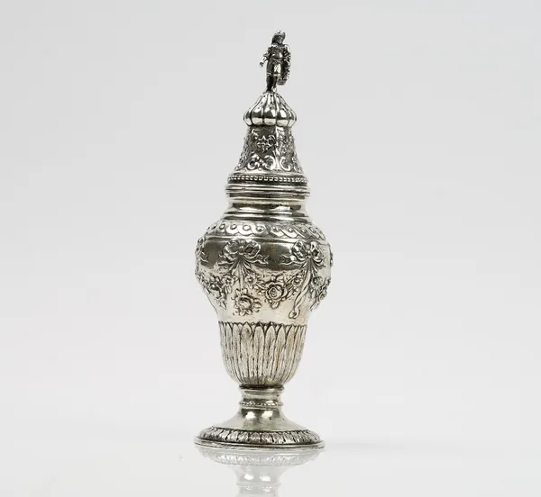 A German sugar caster, of inverted pear shaped form, decorated with floral swags, having ribbon tied bow surmounts, the top with a standing figure fin