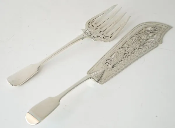 A Victorian silver fish serving slice, pierced and engraved with fish, London 1852 and a Victorian silver fish serving fork in a similar design, Londo