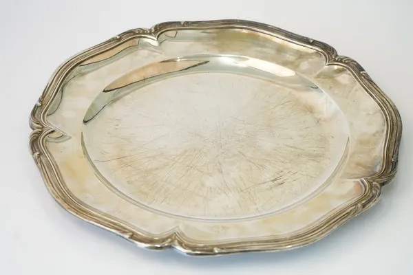 A French main course plate of shaped circular form, with a decorated rim, diameter 32cm, weight 747 gms.