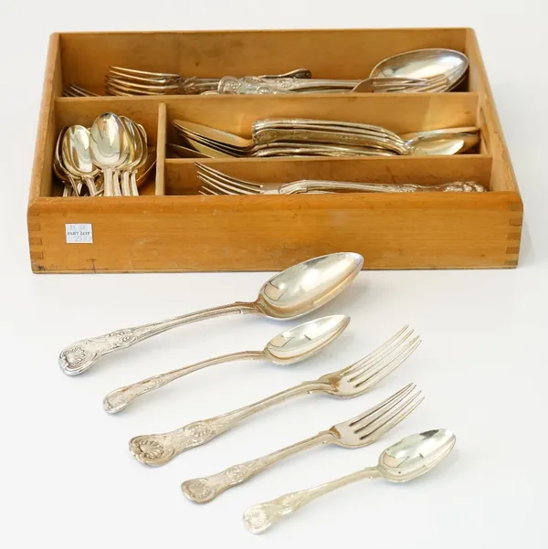 Silver King's pattern table flatware, comprising; twelve dessert spoons, including seven London 1819, four tablespoons, comprising; three London 1821