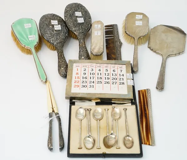 Silver and silver mounted wares, comprising; eight nail head ended teaspoons, Sheffield 1917, a case to hold six teaspoons, a lady's four piece dressi