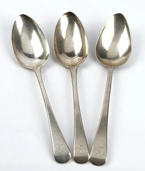 A pair of George III silver Old English pattern table spoons London 1815, and another George III Old English pattern table spoon London 1819, combined