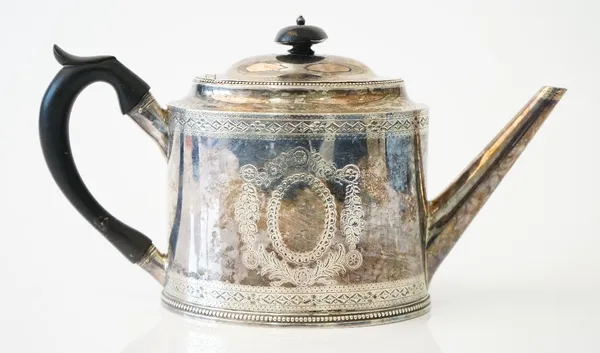 A George III silver teapot, of tapered oval form, with engraved decoration, between beaded rims and with a tapered plain spout, with later replacement