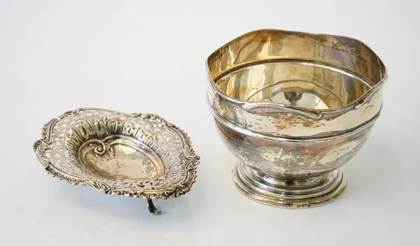 Silver, comprising; a trophy bowl of circular form, having a shaped rim, Birmingham 1909, diameter 12cm and a late Victorian bonbon dish, with pierced