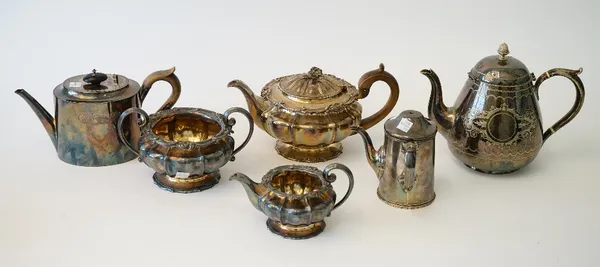 A George IV silver three piece tea set, comprising; a teapot, a twin handled sugar bowl and a milk jug, each piece of compressed shaped circular panel