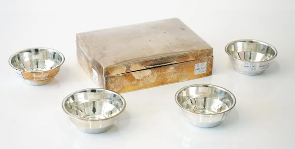 Silver and silver mounted wares, comprising; a rectangular playing cards' box, probably Birmingham 1922 and a set of four small circular bowls, Birmin