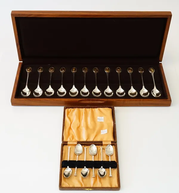 A Royal Society for the Protection of Birds set of 12 silver teaspoons each finial with a different gilt oval insert depicting a named bird, London 19