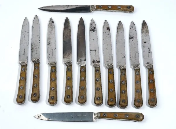 A set of six French steel bladed table knives, detailed Cardeilhac, having horn mounted handles and a set of six French steel bladed cheese knives, de