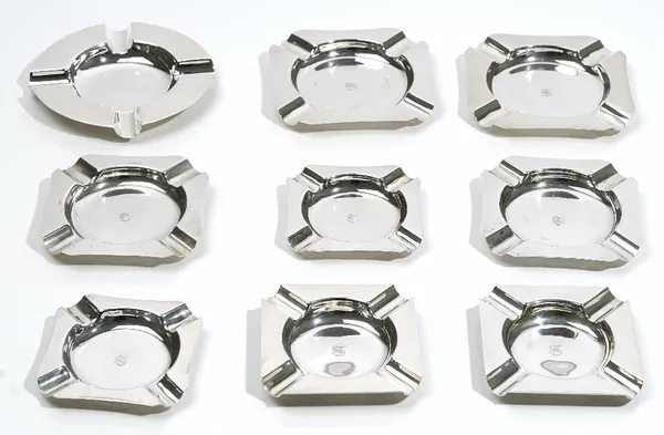 Two pairs of silver ashtrays, each of square form, Birmingham 1978, four further silver square ashtrays, various dates, combined weight 637 gms and a