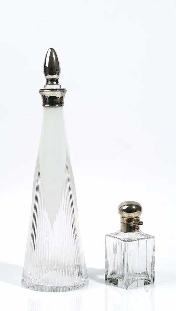 A silver mounted white overlaid faceted glass Vodka decanter, of tapered cylindrical form, height 39.5cm and a silver topped glass small spirit decant