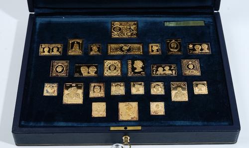 A set of twenty-five silver gilt replica postage stamp ingots, detailed Treasures from The Royal Collection, with a certificate, coloured chart and fi