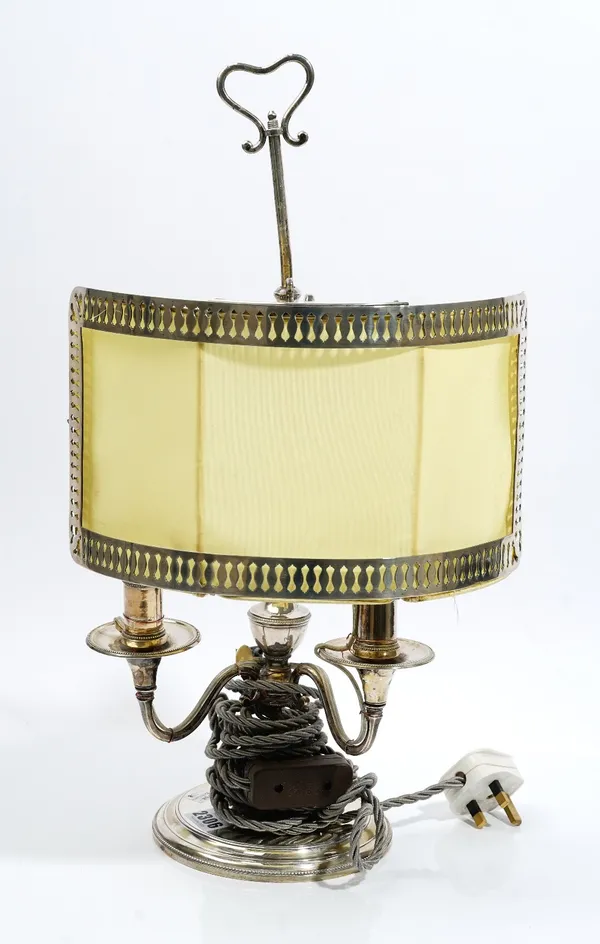 A Spanish sliver twin light desk light, mark of Antonio Martinez, Madrid, 1797, on a circular base having a beaded border, height 50cm.