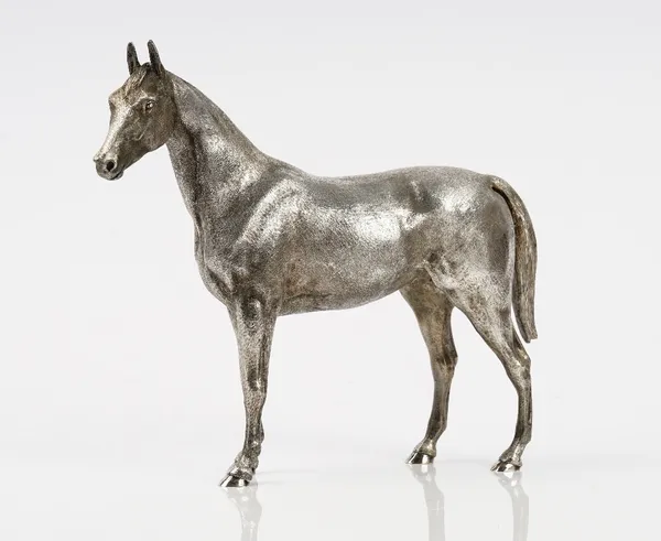 A silver model of a standing horse, London 1981, height 23cm, maker Asprey & Co Ltd, gross weight 1250 gms.