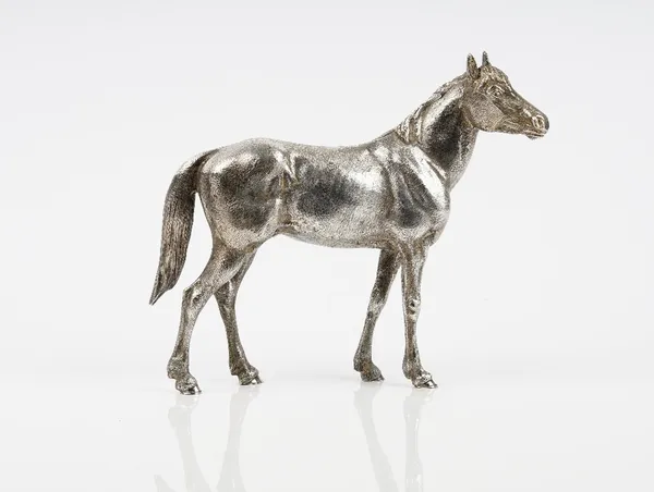 A silver model of a standing horse, London 1978, height 24cm, maker Asprey & Co Ltd, gross weight 2700 gms.