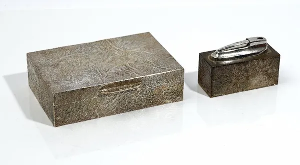 A silver rectangular table cigarette box, wooden lined within, the exterior with bark textured decoration, London 1975, 15.5cm x 10.5cm, also a silver