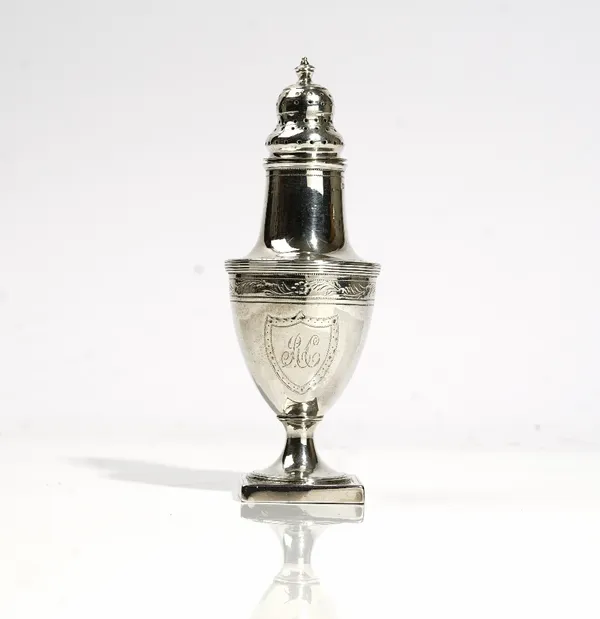 A George III silver vase shape caster, Peter & Ann Bateman, London 1797, bright-cut engraved and with a monogram in a shield cartouche,on a square foo