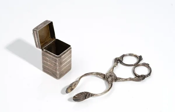 A French square silver box, early 19th century, with hinged cover and engine turned bands, 2.5 x 2.5 x 4cm and a pair of scissor action sugar nips, wi