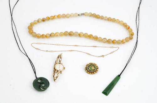 An Omega lady's gilt metal wristwatch, the circular dial with Arabic numbers and baton indicators, to manual wind movement, on an expandable bracelet;