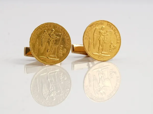 Two French gold 20 francs, mounted as a pair of cufflinks by Kutchinsky Limited, London 1973, combined gross weight 20.6 gms.