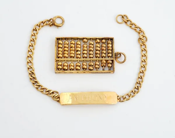 A gold pendant, designed as an abacus, detailed 14 K and a gold faceted curb link identity bracelet, detailed Anthony, combined weight 14.2 gms, (2).