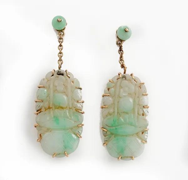 A pair of gold mounted jade pendant earrings, each oval drop with carved and pierced decoration and with a bead surmount, the tops with post and butte