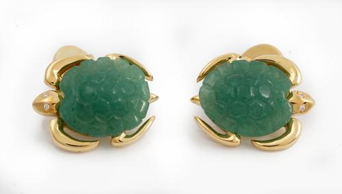 A pair of gold and carved jade dress cufflinks, each front modelled as a turtle, having a carved jade shell and with diamond set eyes, detailed 750, g
