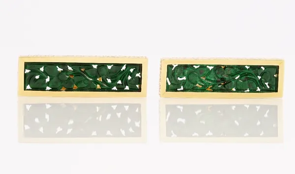 A pair of Grima 18ct gold and jade cufflinks, the rectangular fronts carved and pierced with foliate decoration, detailed 0,750 GRIMA, London 1970, le