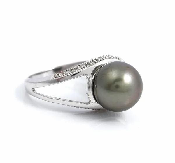 A 9ct white gold, diamond and grey tinted Tahitian cultured pearl ring, the single Tahitian cultured pearl mounted in a loop shaped surround, set with