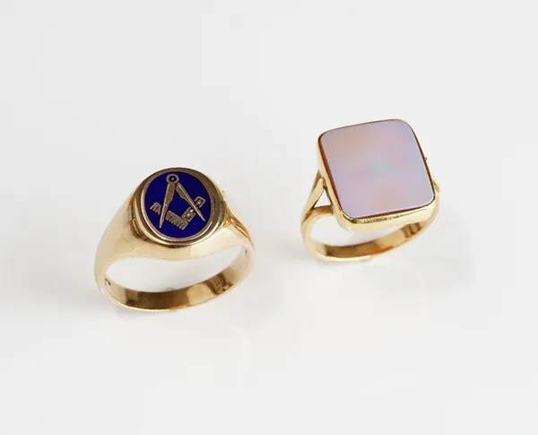 A 9ct gold and blue enamelled Masonic rotating signet ring, with a square and compasses motif, ring size W, gross weight 9.3 gms and a gold and sardon