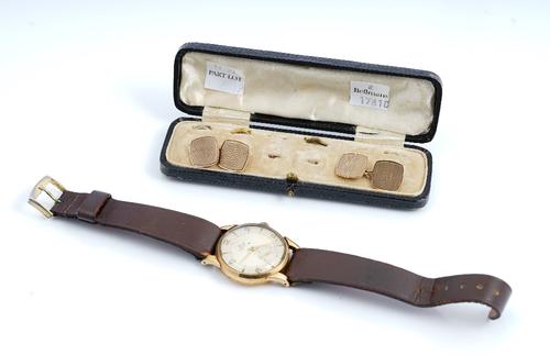 Two similar 9ct gold cufflinks, each in a curved square link design, with engine turned decoration to the backs and to the fronts, Birmingham 1945 and