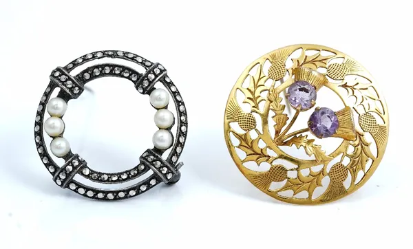 A Scottish 9ct gold and amethyst set circular brooch, designed as a twin thistle spray, Edinburgh 1958, gross weight 4.6 gms and a Sterling silver cul