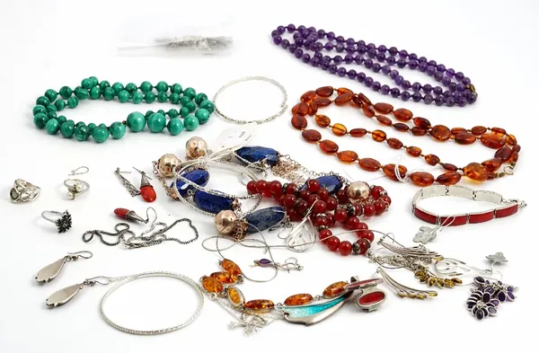 A collection of silver and hardstone jewellery, including: a malachite bead necklace of graduated design; an amethyst bead necklace of uniform design;