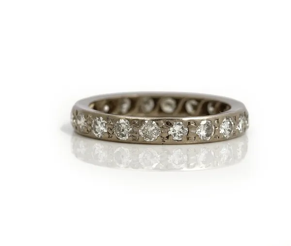 A diamond set full eternity ring, mounted with circular cut diamonds, ring size P and a half, gross weight 4.3 gms.