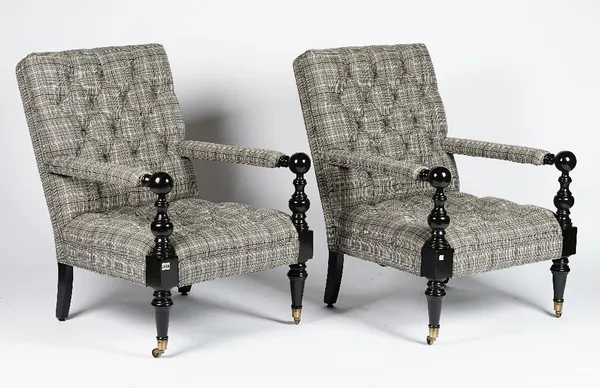 A pair of Nantucket turned ebonised frame armchairs, button down upholstered in check pattern material, 62cm wide x 92cm high, (2).