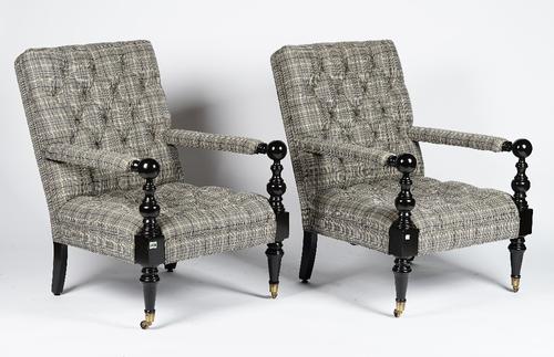 A pair of Nantucket turned ebonised frame armchairs, button down upholstered in check pattern material, 62cm wide x 92cm high, (2).