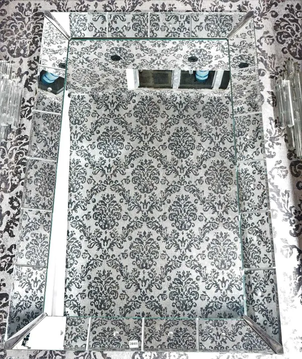 A marginal rectangular wall mirror, 40cm wide x 153cm high.