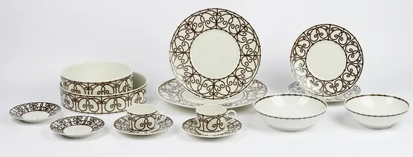 A Limoges J L Coquet tea and dinner service, and with various serving dishes (qty).