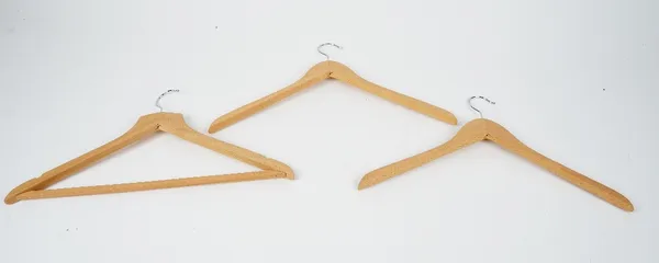 A large collection of wooden coat hangers (qty).